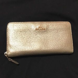 Coach gold pebbled leather wallet